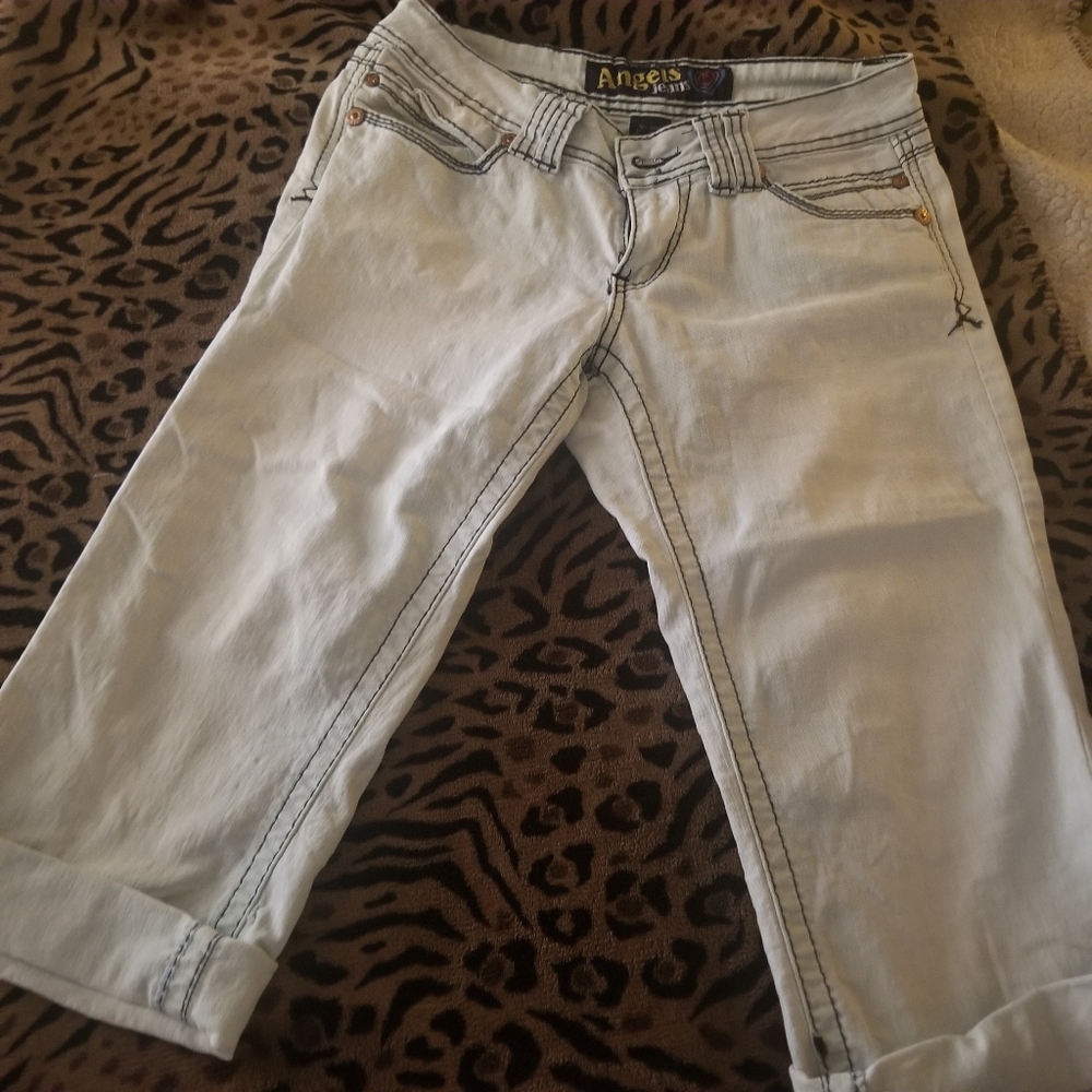 Angel's cropped, cuffed below the knee jeans